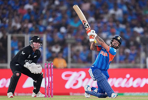 India's Ishan Kishan plays a shot during the T20 World Cup cricket final match between India and New Zealand in Ahmedabad.