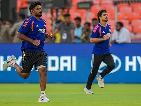 India's Sanju Samson, left, and Ishan Kishan during a training session on the eve of the ICC Men's T20 World Cup 2026 final cricket match between India and New Zealand, at the Narendra Modi Stadium in Ahmedabad, Gujarat.