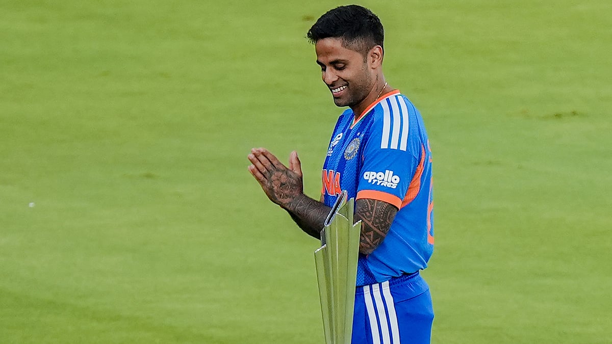 PTI : Captain Suryakumar Yadav poses with the trophy on the eve of the ICC Men's T20 World Cup 2026 final between India and New Zealand, at the Narendra Modi Stadium in Ahmedabad.