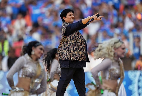 Indian singer Falguni Pathak, center, performs during the closing ceremony of the T20 World Cup cricket final match between India and New Zealand in Ahmedabad.