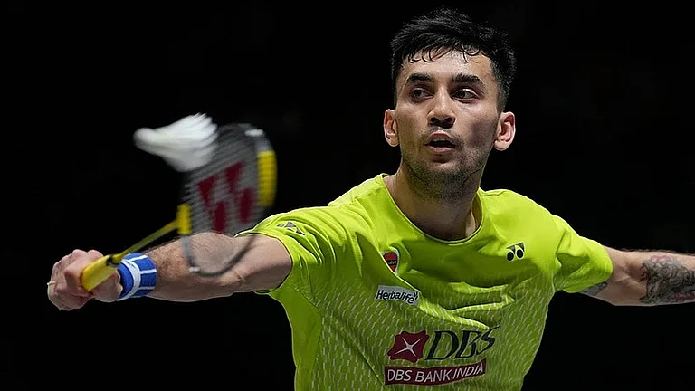 India's Lakshya Sen plays against Canada's Victor Lai during the men's singles semi-final match at the All England Open Badminton Championships in Birmingham, England. - Photo: AP