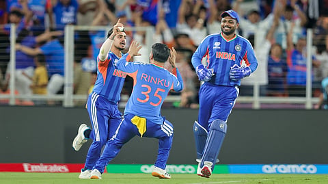 Ishan Kishan celebrates after taking the catch of New Zealand's Tim Siefert at the Narendra Modi Stadium on Sunday, March 8, 2026.