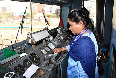 A womn loco pilot after flagging off the Ranchi-Lohardaga Passenger Express on the occasion of International Women's Day, in Ranchi, Jharkhand.