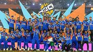 | Photo: PTI/Shailendra Bhojak : India's captain Suryakumar Yadav lifts the tournament trophy with teammates after winning the ICC Men's T20 World Cup 2026, at Narendra Modi Stadium, in Ahmedabad, Gujarat.