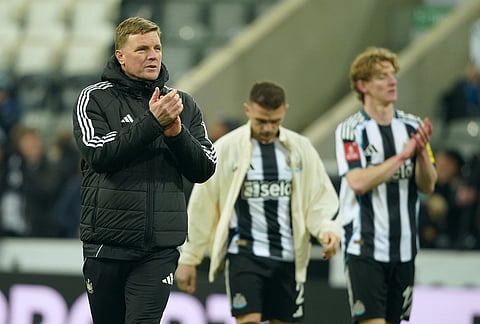 Newcastle's head coach Eddie Howe walks off the pitch after the fifth round FA Cup soccer match between Newcastle and Manchester City in Newcastle, England.
