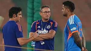 AP : India's head coach Gautam Gambhir, left, chief selector Ajit Agarkar, centre, and captain Suryakumar Yadav talk during a practice session ahead of the T20 World Cup final against New Zealand in Ahmedabad.