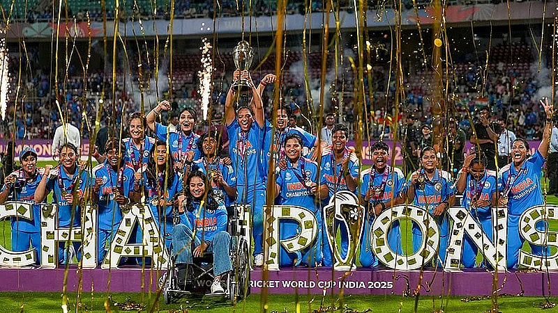 PTI : India’s players celebrate with the trophy during the presentation ceremony after winning the ICC Women's World Cup 2025, at the DY Patil Stadium in Navi Mumbai.