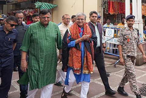 Chief Election Commissioner Gyanesh Kumar visits the Kalighat Kali Temple, in Kolkata. Gyanesh Kumar faced "go back" slogans and was shown black flags on Monday morning when he visited the temple. 