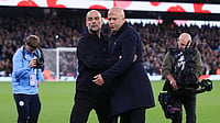 Man City boss Pep Guardiola and Liverpool boss Arne Slot