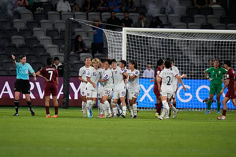 Taiwan players celebrate their second goal against India during the Women's Asian Cup soccer match between India and Taiwan in Sydney.