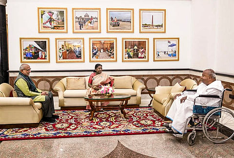 President Droupadi Murmu, center, Vice President CP Radhakrishnan, left, and Janata Dal (Secular) supremo HD Deve Gowda during a meeting at the Rashtrapati Bhavan Cultural Centre, in New Delhi. 