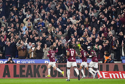 West Ham United's Jarrod Bowen, left, celebrates scoring during the English FA Cup fifth round soccer match between West Ham United and Brentford in London.