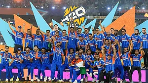 | Photo: PTI/Shailendra Bhojak : India's captain Suryakumar Yadav lifts the tournament trophy with teammates after winning the ICC Men's T20 World Cup 2026, at Narendra Modi Stadium, in Ahmedabad, Gujarat.