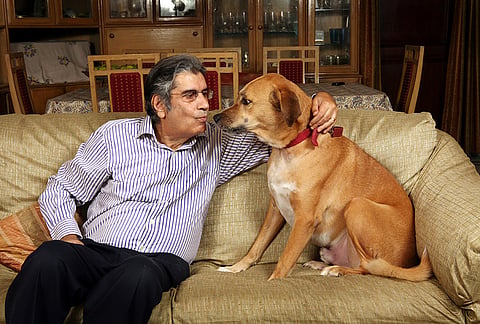 Vinod Mehta, Editor-in-Chief of Outlook Group and his dog.