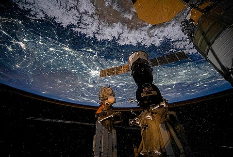 A nighttime cityscape of India is seen from the International Space Station as it passes over the Arabian Sea and across the Himalayas. 