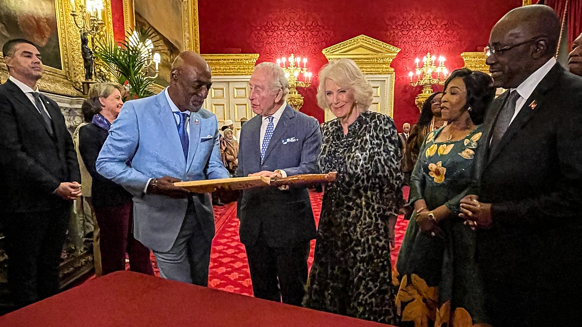 PTI : Former West Indies cricketer Sir Viv Richards presents a special cricket bat to King Charles III and Queen Camilla at St. James's Palace in London.