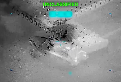 Explosions are seen as US forces strike an Iranian vessel near the Strait of Hormuz. US says it destroyed 16 mine-laying vessels as Iran threatens to block Gulf oil exports. 