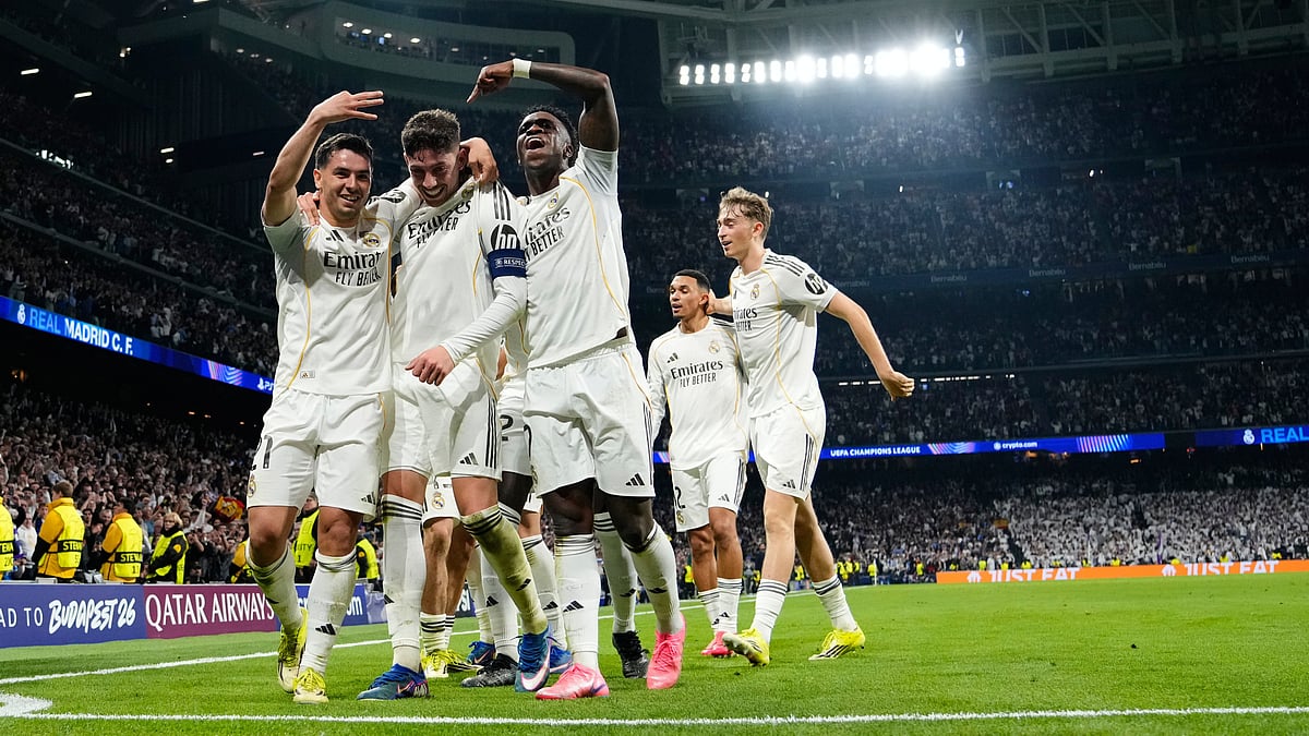 | Photo: AP/Jose Breton : Real Madrid's Federico Valverde, center, celebrates after scoring his third goal during a first leg round of 16 Champions League soccer match between Real Madrid and Manchester City in Madrid, Spain, Wednesday, March 11, 2026. 