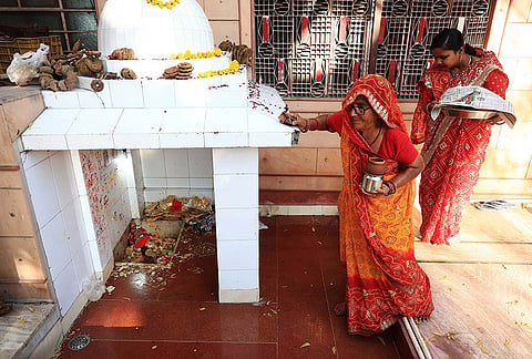 Women perform rituals on the occasion of 'Sheetala Ashtami', in Jaipur, Rajasthan. This Hindu festival that honours goddess Sheetala, is celebrated on the eighth day or the third quarter of the Lunar Cycle after the Holi festival. 