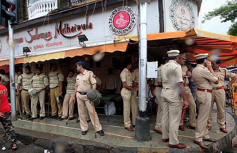 JULY 30,2015: Mumbai police stand on guard at Mahim Dargah as the body of 1993 blast accused Yakub Memon is about to arrive from Nagpur Jail on July 30, 2015 in Mumbai, India.
