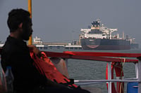 Tensions In Strait Of Hormuz: The Hidden Economic Risk For India Rafiq Maqbool : Liberia-flagged tanker Shenlong Suezmax, carrying crude oil from Saudi Arabia, that arrived clearing the Strait of Hormuz, is seen at the Mumbai Port in Mumbai, India, Thursday, March 12, 2026. (AP Photo/Rafiq Maqbool)