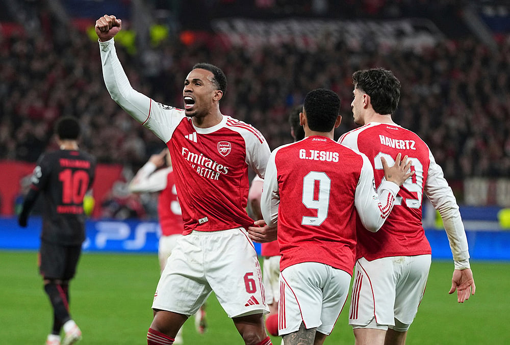 | Photo: AP/Martin Meissner : Arsenal's Gabriel celebrates the first goal of his team during the Champions League round of 16 first leg soccer match between Bayer Leverkusen and Arsenal FC in Leverkusen, Germany.