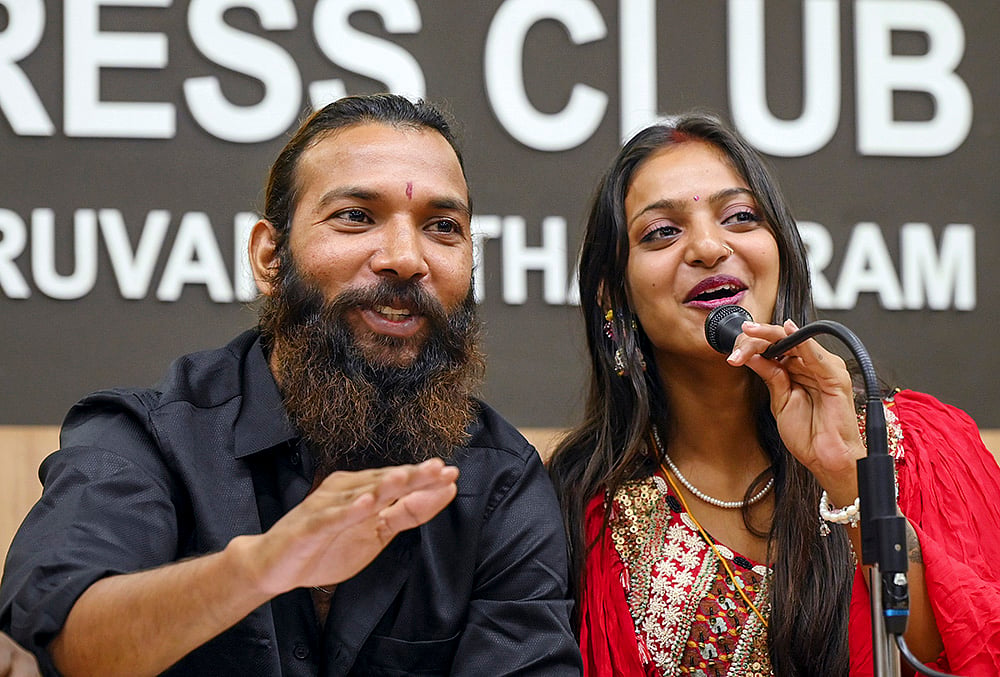 | Photo: PTI : Monalisa from Indore, who went viral on social media at the Kumbh Mela, with her husband Farman Khan during a press conference, in Thiruvananthapuram. The couple got married at a temple in Thiruvananthapuram on Wednesday. 