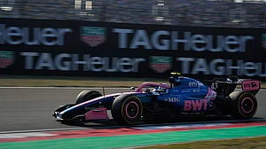 | Photo: AP/Vincent Thian : Alpine driver Franco Colapinto of Argentina steers his car during the sprint qualifying ahead of the Chinese Formula One Grand Prix race in Shanghai, China, Friday, March 13, 2026.
