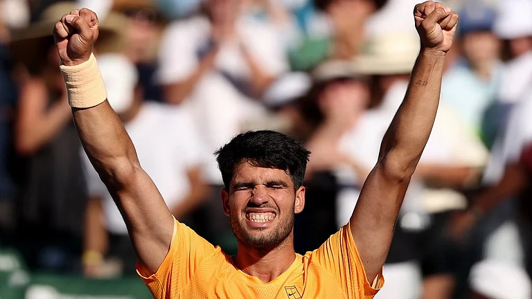 Carlos Alcaraz celebrating his victory against Cameron Norrie at the Indian Wells Open 2026. - carlosalcaraz/X