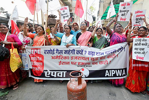 All India Progressive Women's Association workers stage a protest over the shortage of domestic and commercial LPG cylinders, in Patna.