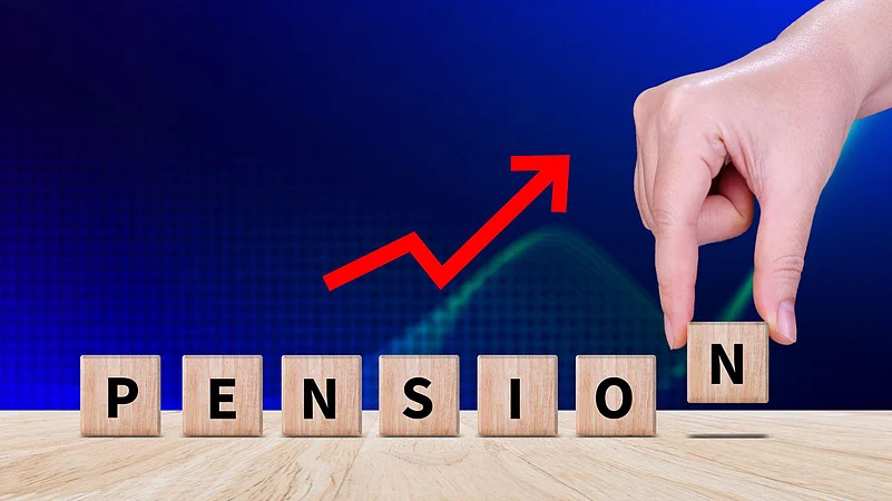 Hand completing PENSION blocks with rising arrow
