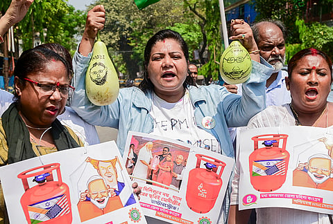West Bengal INTUC and Congress workers stage a protest over the shortage of domestic and commercial LPG cylinders, in Kolkata.