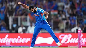 | Photo: AP/Ajit Solanki : India's Jasprit Bumrah celebrates the wicket of New Zealand's James Neesham during the T20 World Cup cricket final match between India and New Zealand in Ahmedabad.