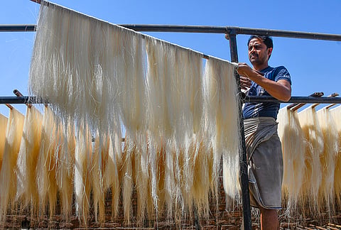 A worker prepares vermicelli on the last friday during the holy month of 'Ramzan', in Prayagraj.