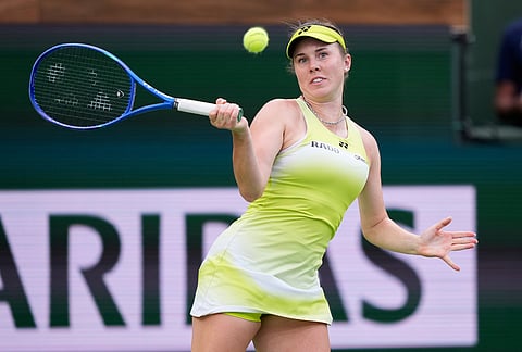 Linda Noskova, of the Czech Republic, returns a shot against Aryna Sabalenka, of Belarus, during a semifinal match at the BNP Paribas Open tennis tournament, in Indian Wells, California.
