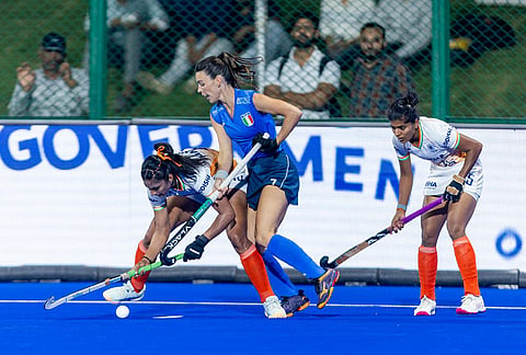 Italy's Emilia Munitis and India's Manisha Chouhan in action during their FIH Women's Hockey World Cup Qualifiers match on March 13, 2026.