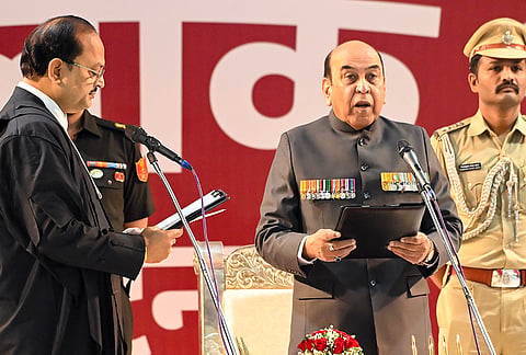 Chief Justice of Patna High Court Justice Sangam Kumar Sahoo administers the oath to Syed Ata Hasnain as the new Governor of Bihar, at Lok Bhawan, in Patna.