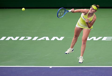 Linda Noskova, of the Czech Republic, serves against Aryna Sabalenka, of Belarus, during a semifinal match at the BNP Paribas Open tennis tournament, Friday, March 13, 2026, in Indian Wells, California.