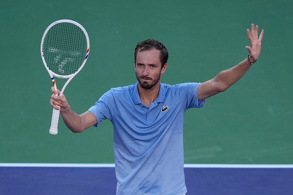 | Photo: AP/Mark J. Terrill : Daniil Medvedev, of Russia, celebrates after defeating Carlos Alcaraz, of Spain, during a semifinal match at the BNP Paribas Open tennis tournament, Saturday, March 14, 2026, in Indian Wells, Calif. ()