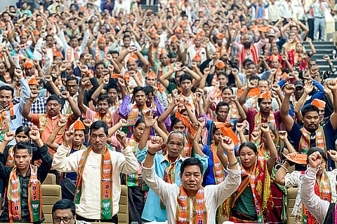 New BJP members from Tipra Motha and Communist Party of India (Marxist) during a joining programme at Rabindra Bhavan, in Agartala.