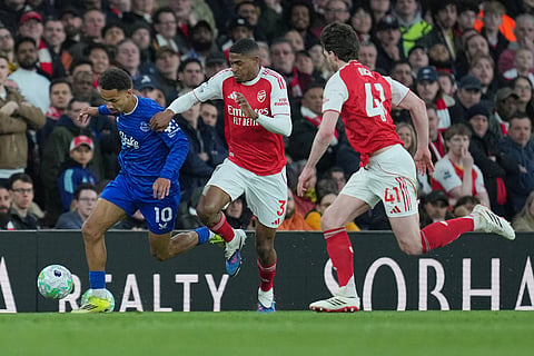 Everton's Iliman Ndiaye, left, and Arsenal's Cristhian Mosquera fight for the ball during the English Premier League soccer match between Arsenal and Everton in London, England.