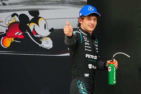 Mercedes driver Andrea Kimi Antonelli of Italy reacts on the podium after he clocked the fastest time to win the Chinese Formula One Grand Prix race at the Shanghai International Circuit, in Shanghai, China.