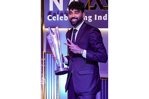 Indian men's cricket team player Mohammed Siraj with a trophy during the BCCI Naman Awards 2026, in New Delhi.