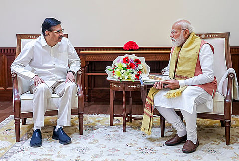 Prime Minister Narendra Modi with Odisha Governor Hari Babu during a meeting, in New Delhi. 