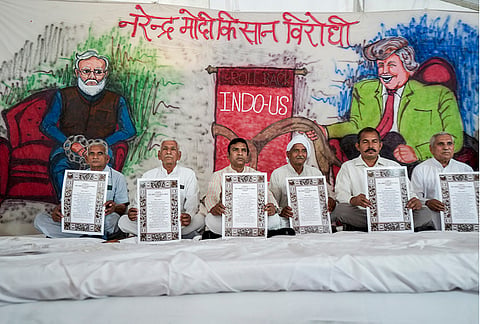 Congress leaders protest against the India-US trade deal at Jantar Mantar, in New Delhi.