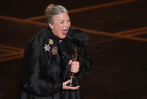 Kate Hawley accepts the award for costume design for "Frankenstein" during the Oscars at the Dolby Theatre in Los Angeles.