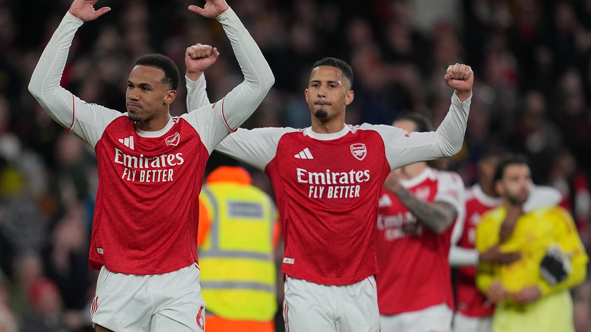 | Photo: AP/Kin Cheung : Arsenal's Gabriel, left, and William Saliba celebrate after the English Premier League soccer match between Arsenal and Everton in London, England, Saturday, March 14, 2026. 
