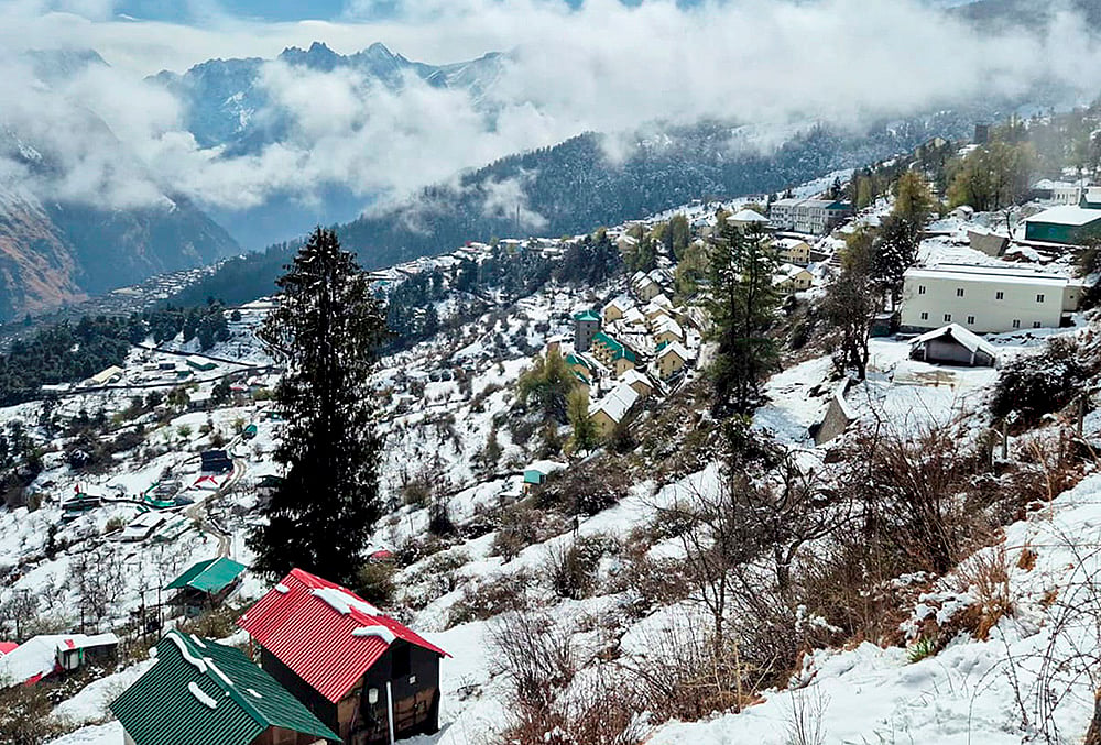 | Photo: PTI : A view of snow-capped mountains after fresh snowfall, in Chamoli, Uttarakhand.