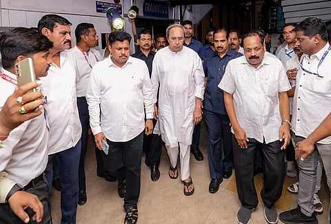 Biju Janata Dal (BJD) chief Naveen Patnaik, centre, visits SCB Medical College and Hospital following a massive fire in the trauma care department, in Cuttack, Odisha. 