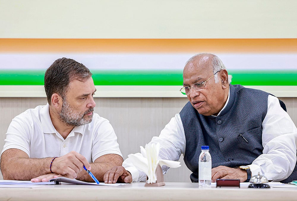 Congress President and LoP in the Rajya Sabha Mallikarjun Kharge interacts with LoP in the Lok Sabha Rahul Gandhi during a Congress Central Election Committee (CEC) meeting for Kerala, in New Delhi.  - | Photo: AICC via PTI 